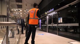 TFL staff member makes a 'boxing anouncer' style anouncement at Paddington Crossrail