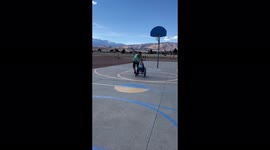 'Basketball-loving dad & son redefine the meaning of a head shot '