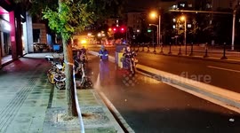 Workers Disinfecting A Road In Shanghai, China