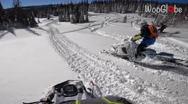 'Headcam footage shows two snowmobiles almost crashing into each other '