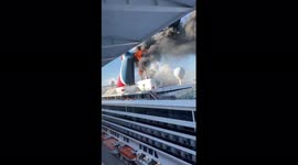 Cruise ship fire: Shocking video captures flames and smoke pouring from Carnival Freedom ship in Grand Turk
