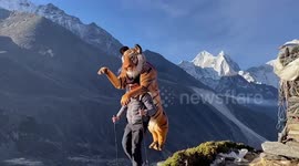 UK wildlife photographer to run Everest marathon in TIGER suit after gruelling ten-day trek
