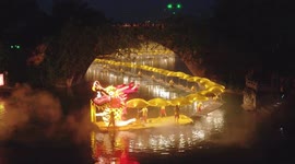 Spectacular footage shows 700-metre-long dragon boat winding along river