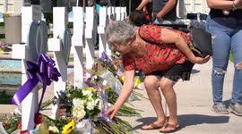 Uvalde shooting: Mourners lay flowers at crosses for the victims of Texas school tragedy
