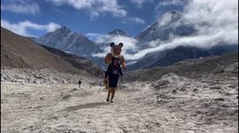 British wildlife photographer completes gruelling Everest marathon - with 9ft tiger on his back