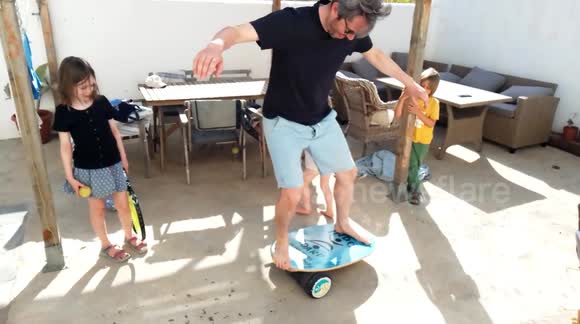 Amusing moment British tourist wipes out in holiday balance board fail