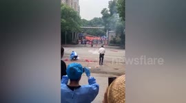 Shanghai residents set off fireworks to celebrate plans to end city's lockdown