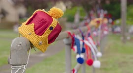 Village is 'yarn bombed' with colourful display to celebrate the Queen's Platinum Jubilee