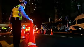 Traffic police remove roadblocks as 2-month lockdown is eased in Shanghai