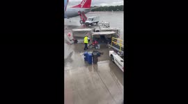 Co-pilot wins passenger hearts by loading baggage after 30-hour delay at Manchester Airport