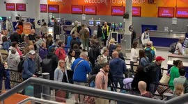 Bristol Airport morning lengthy queues and armed police patrols as the Jubilee holiday begins