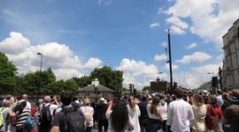 Fighter jets fly over Buckingham Palace in the formation of the number '70'
