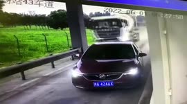 Toll station collapses after hit by cement truck in China
