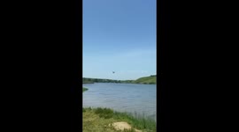 Russian K-52 helicopter staged a show over the water in Alchevsk