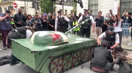 Pro-Democracy Activists Lie Down in the Road as if Crushed by a Tank in Tiananmen Square Massacre Protest Outside London Chinese Embassy