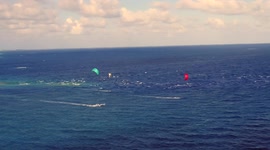 Explore the world by harnessing nature's energy through sailing and kiteboarding through the South Pacific Islands