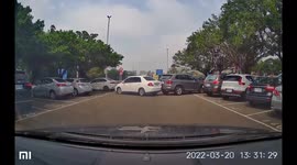 Accident: Two cars reversing out of bays at the same time rear-ended each other (Dashcam Video)