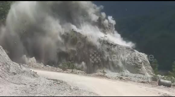 Exploded Mounten Dramatic industrial explosion footage of mountain blast during road ...
