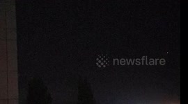 UFO / UAP over Cardiff Bay, South Wales, UK, disappears into portal: our military or aliens?