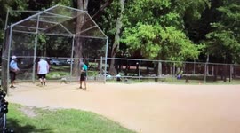Man falls down during baseball