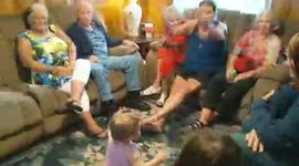 Group of women mimic baby girl
