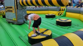 Boy unable to jump over bar