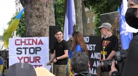 Ukraine nation anthem sung by Ukrainians and Honkkongers during joint protest opposite 10 Downing Street