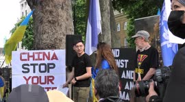 Ukraine nation anthem sung by Ukrainians and Honkkongers during joint protest opposite 10 Downing Street