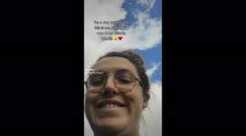 Dog walker shows what it's like to pick up one of her cute furry clients!