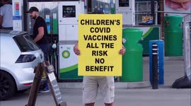 Children's Covid vaccine protesters gather outside petrol station in Kent, UK