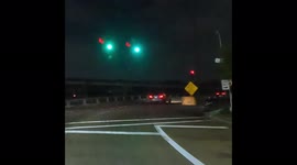 Houston driver with no headlights has near miss with concrete wall