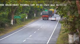 Watch - Leopard at Kaziranga National park attacks cyclist in an attempt to cross the road , cyclist escaped miraculously