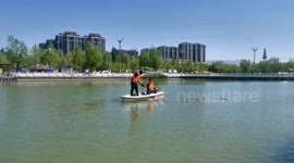 Workers Remove Water Weeds in Zhangjiakou, China before the World Environment Day