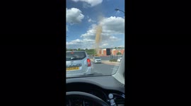 Spectacular dust devil swirls updraft amid increasing temperatures in UK