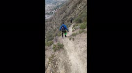 Sportsman almost falls down the hill