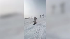 Triple gold medallist skier performs incredible stunts including juggling a football and skiing WITHOUT SKIS