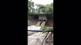 Watch - A commuter saved himself from a disaster by a whisker as the culvert road he was walking across caved in due to floods