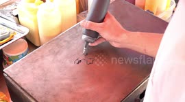 Chef makes cartoon pancake caricature of Russian President Vladimir Putin