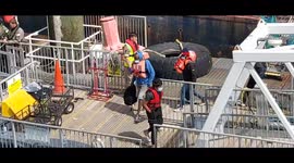 Migrants walking up the ramp after being dropped off at Dover by the Border Force