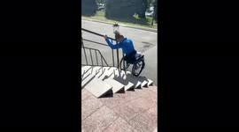 Russian Paralympic athletes crawl into the Rossiya Hotel