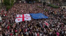 Georgians hold aloft flag of Europe at pro-EU rally attended by tens of thousands in Tbilisi