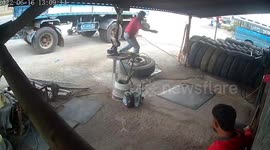 Overinflated tyre explodes in mechanic's repair shop in Thailand