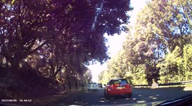 DASHCAM - Dangerous Driving - Irresponsible Mini Driver deliberately jumps read light, despite having plenty of opportunity/time to stop.