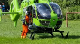 Air ambulance landing and taking off Hartcliffe Bristol