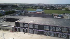 New School in Cornwall UK threatened with demolition before it is even completed. The Builders went into Administration.