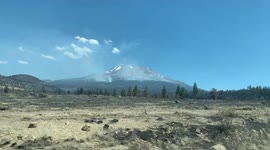 A forest fire on the flanks of Mt. Shasta, California, during wildfire season (USA West)