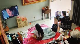 Terrified girlfriend jumps away in fear after finding baby cobra under duvet