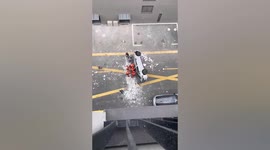 Two killed as electric car falls from third floor of parking lot in Shanghai