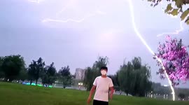 Large lightning bolt frightens man who attempted to take picture with it
