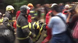 The woman who was crushed by a concrete slab after the rocket hit is a citizen of the Russian Federation.